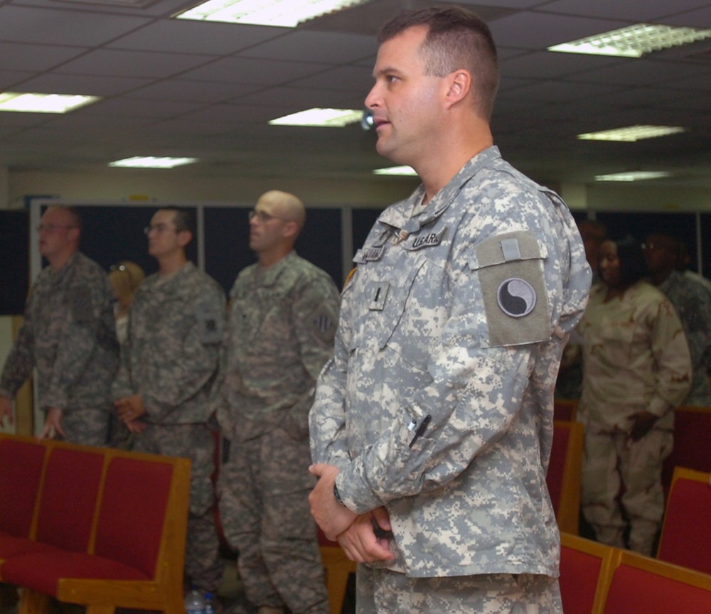 At Camp Buehring, Soldiers pray before heading into Iraq