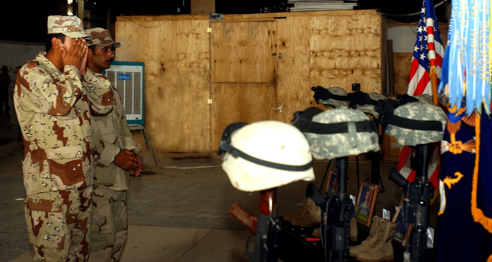 Soldiers pay respects to fallen comrades