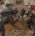 Iraqi Army Officers Fire New Weapons at Camp Taji