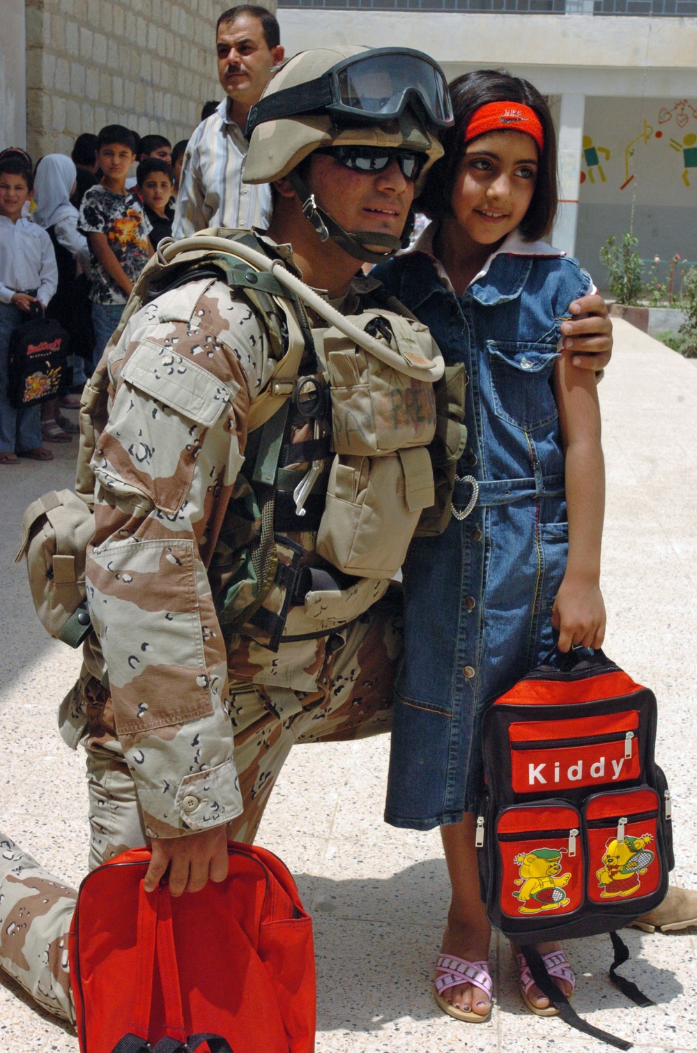 U.S., Iraqi Soldiers Deliver Backpacks and Smiles to Kirkuk Children