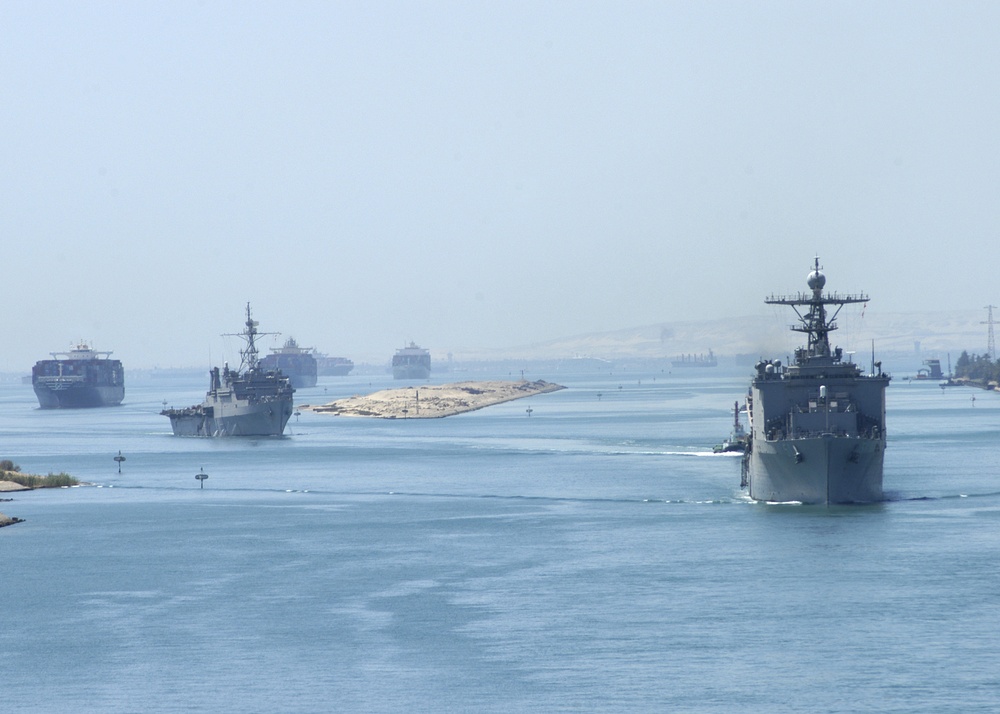 Naval Ships Move Down Suez Canal