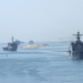 Naval Ships Move Down Suez Canal