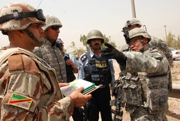 Taking charge:  Iraqi Security Forces out in front on joint patrols in Sule