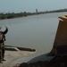Iraqi and U.S. Soldiers Repair Pontoon Bridge