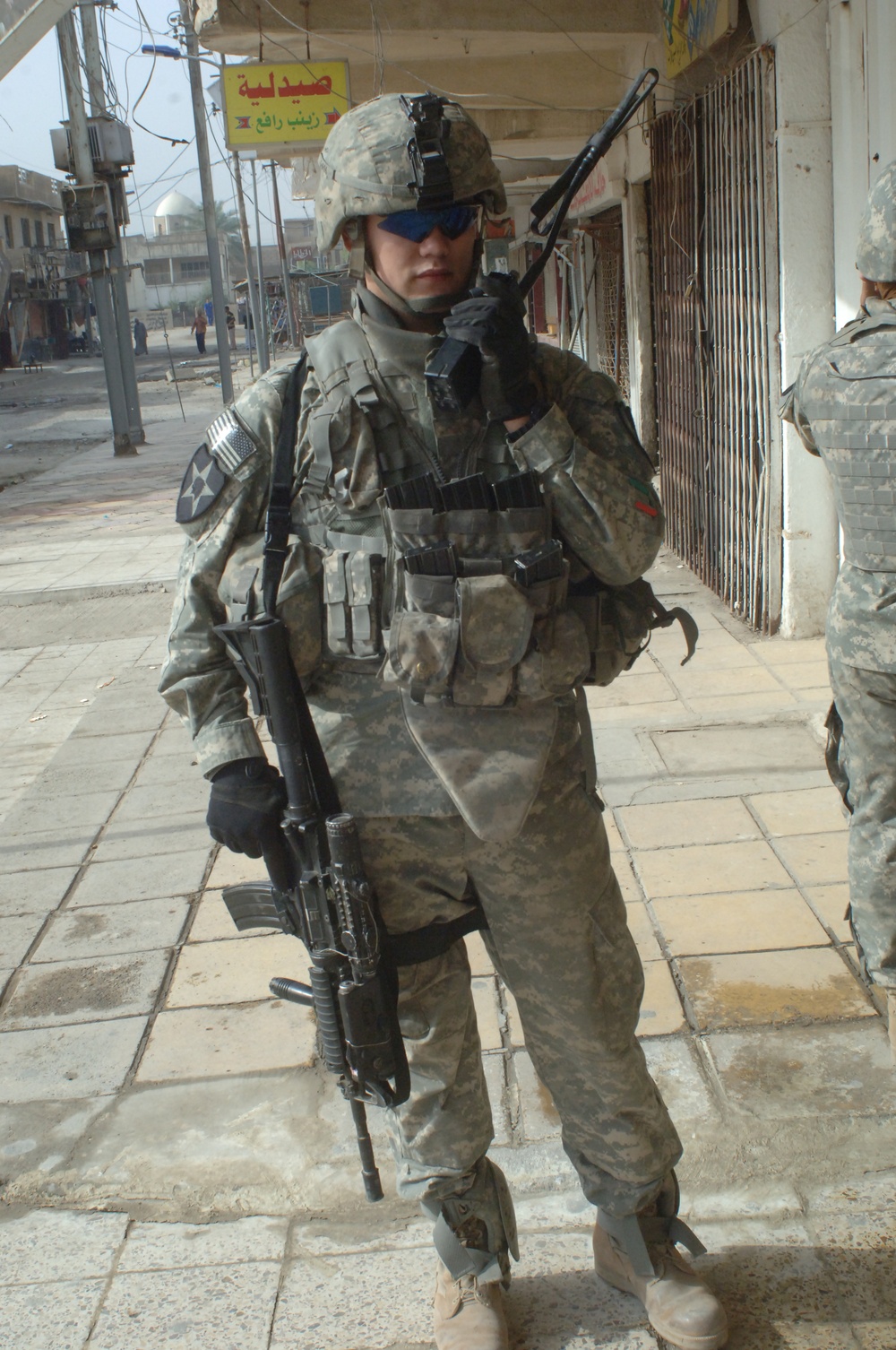 Soldiers Patrol Local Market