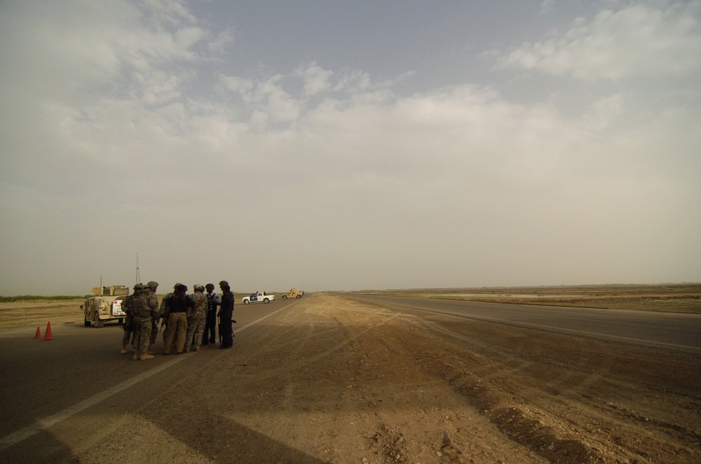 Soldiers in Police Transition Team assist Iraqi Highway Patrol
