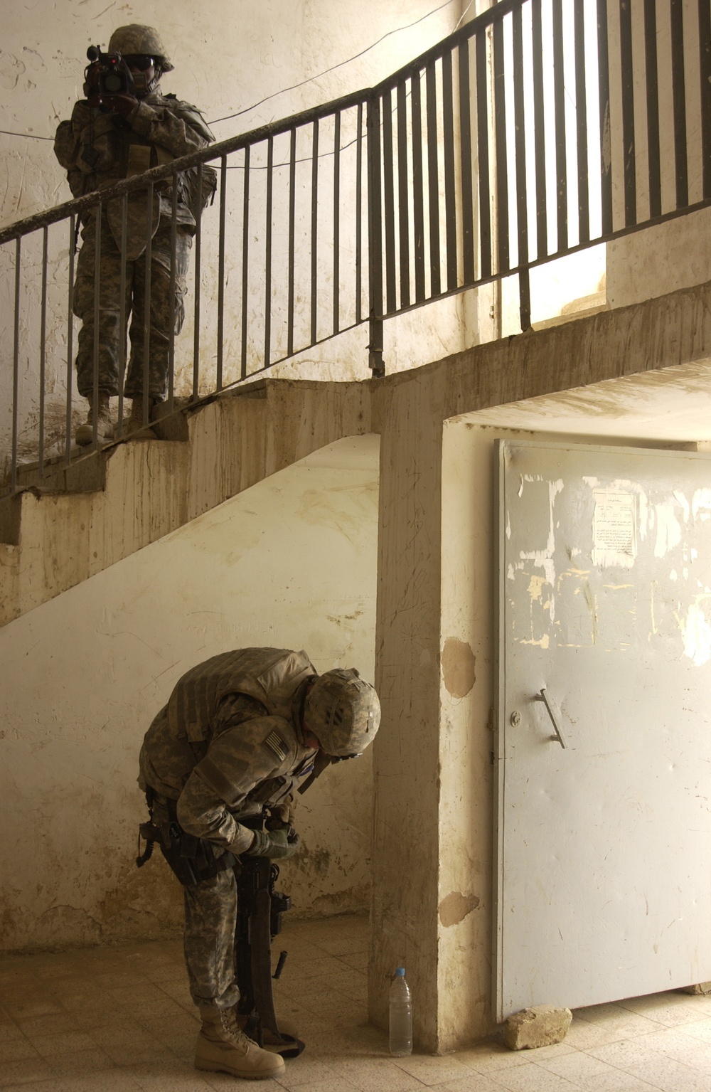 U.S. Army Military Police work with Iraqi police