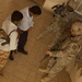 U.S. Army Military Police work with Iraqi police