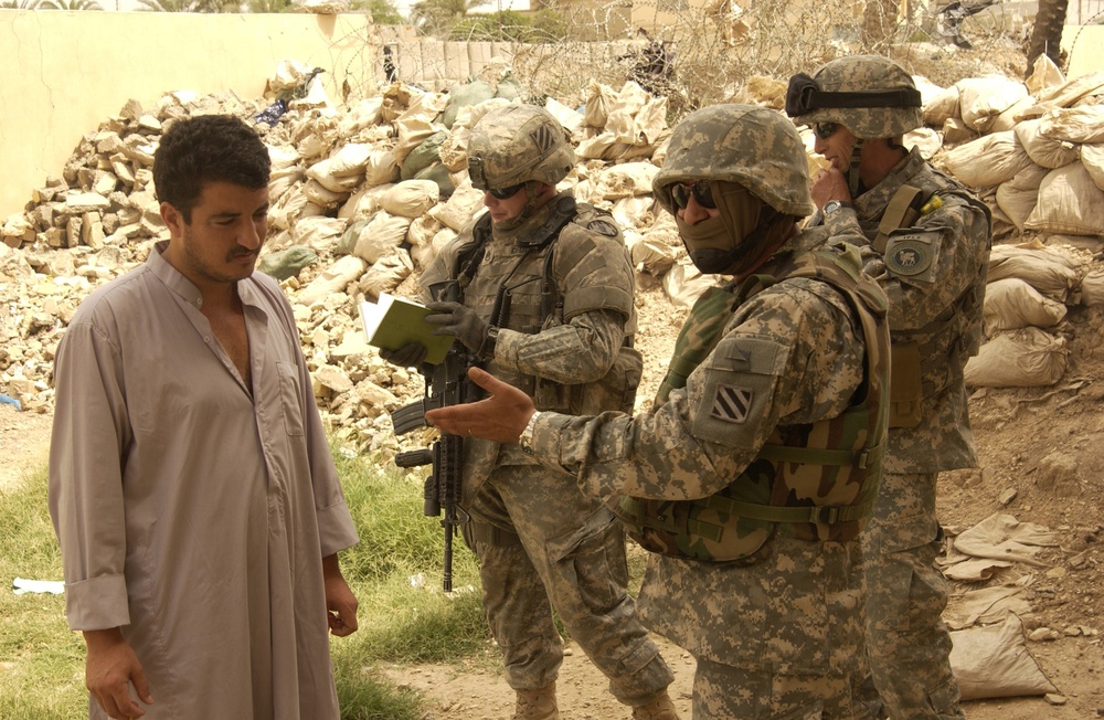 U.S. Army Military Police Assist Iraqi Police