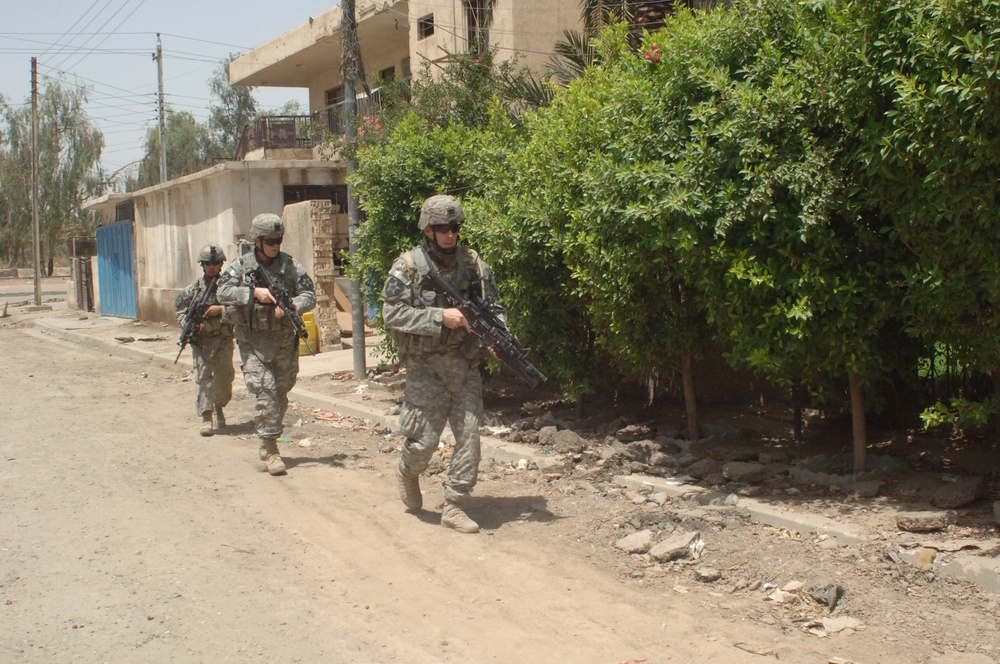 Soldiers From 2nd BCT, 2nd Inf. Div Patrol Al Dora Area