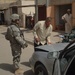 Soldiers from 4th Brigade Combat Team, 1st Infantry Divison Search Vehicles