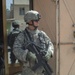 Soldiers from 4th Brigade Combat Team, 1st Infantry Divison Search Vehicles