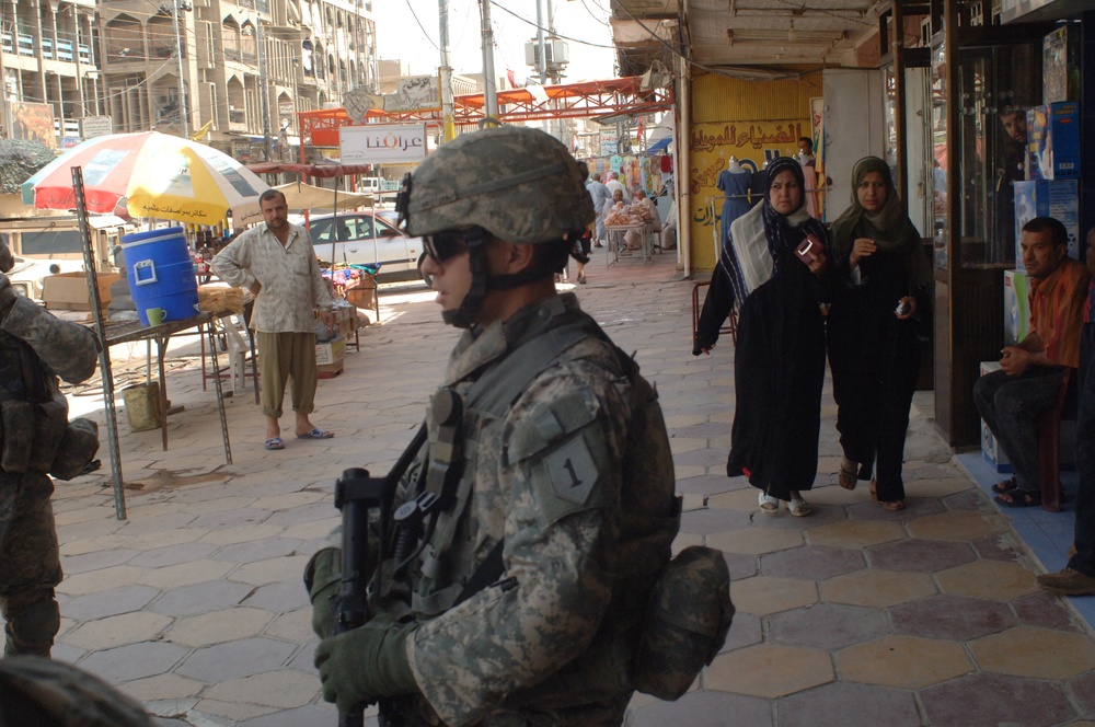 Soldiers from 4th Brigade Combat Team, 1st Infantry Divison Search Vehicles