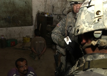 Soldiers Sweep and Search During Operation Ant Hill