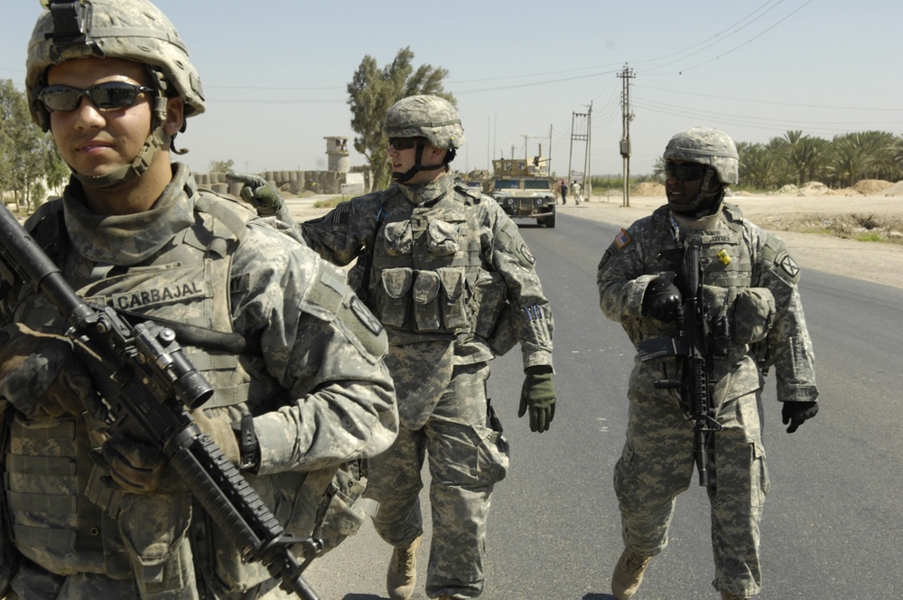 U.S., Iraqi Soldiers patrol streets of southwest Baghdad