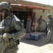 U.S., Iraqi Soldiers patrol streets of southwest Baghdad