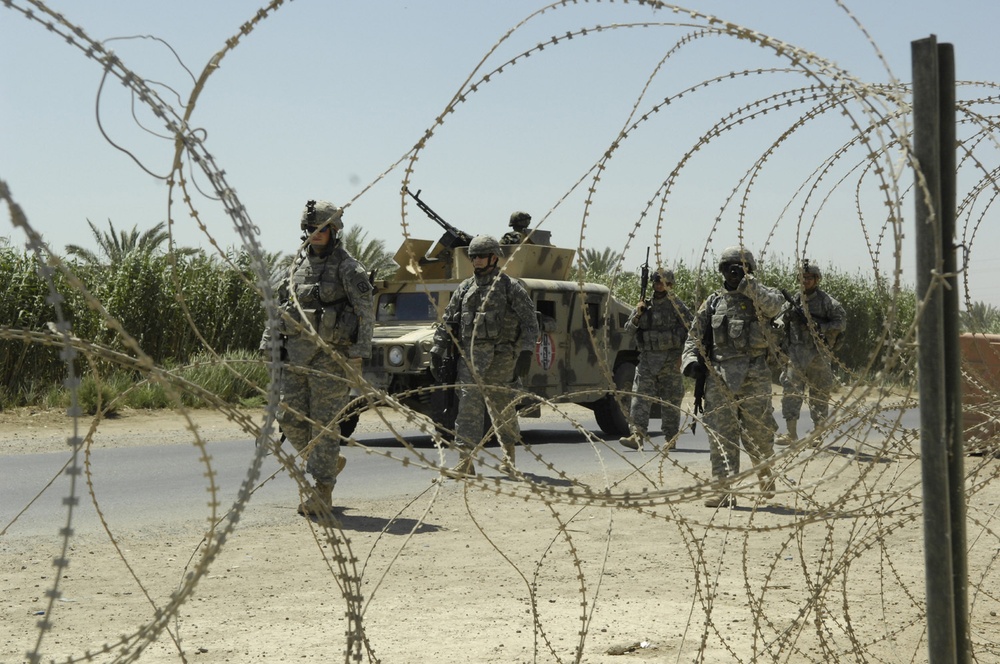 U.S., Iraqi Soldiers patrol streets of southwest Baghdad