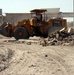 US and Iraqi Soldiers Guard and Support Reconstruction Efforts