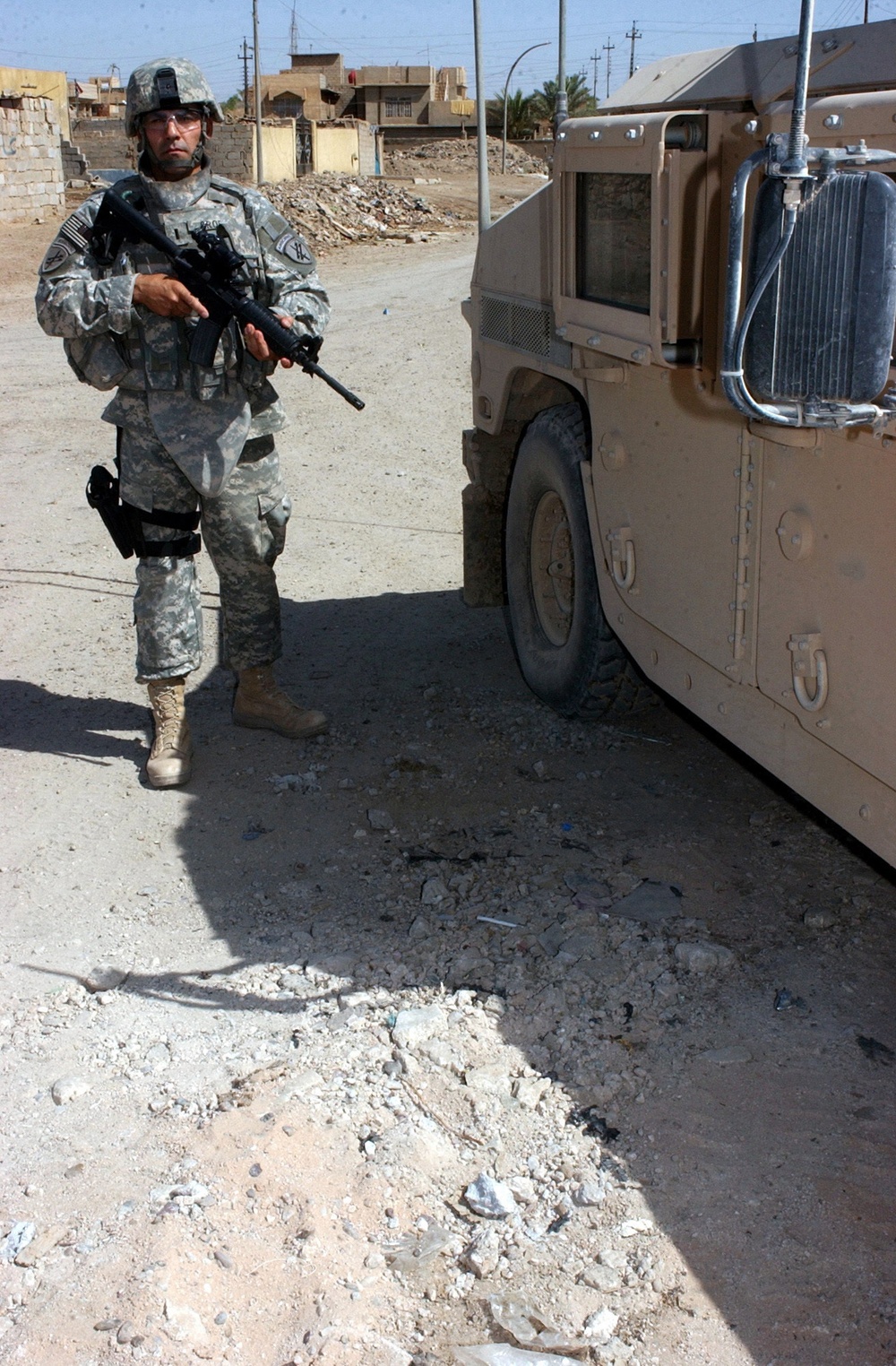 US and Iraqi Soldiers Guard and Support Reconstruction Efforts