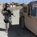 US and Iraqi Soldiers Guard and Support Reconstruction Efforts