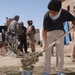 US and Iraqi Soldiers Guard and Support Reconstruction Efforts