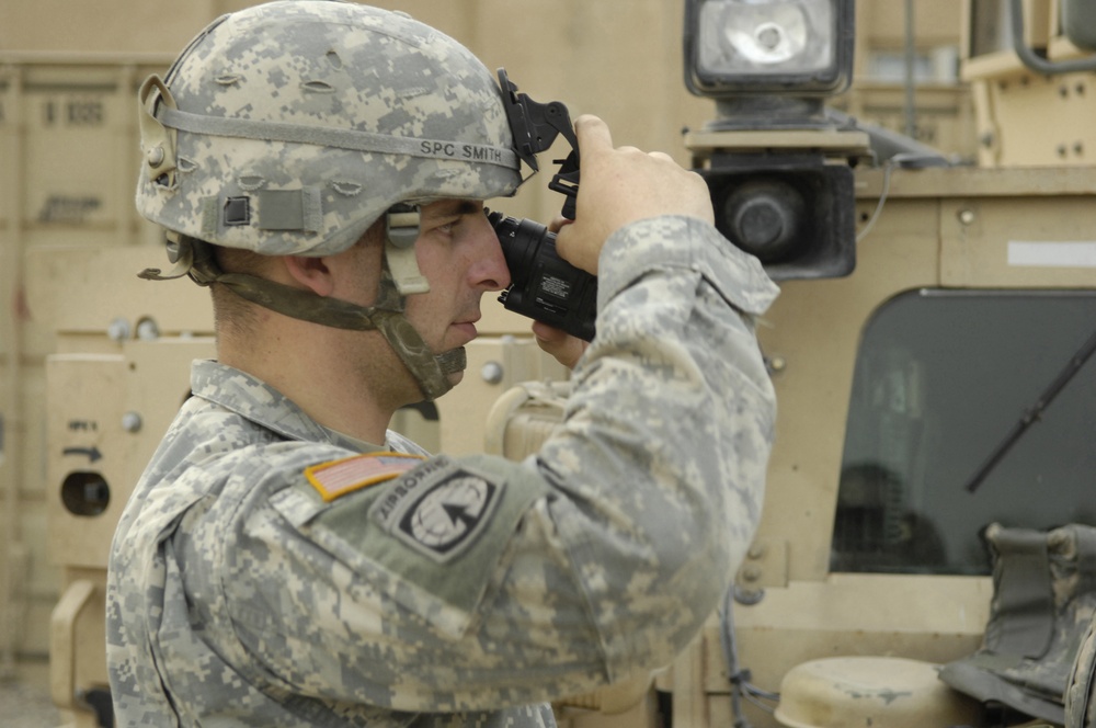 Iraqi Police, U.S. Army Military Police Work Day into Night