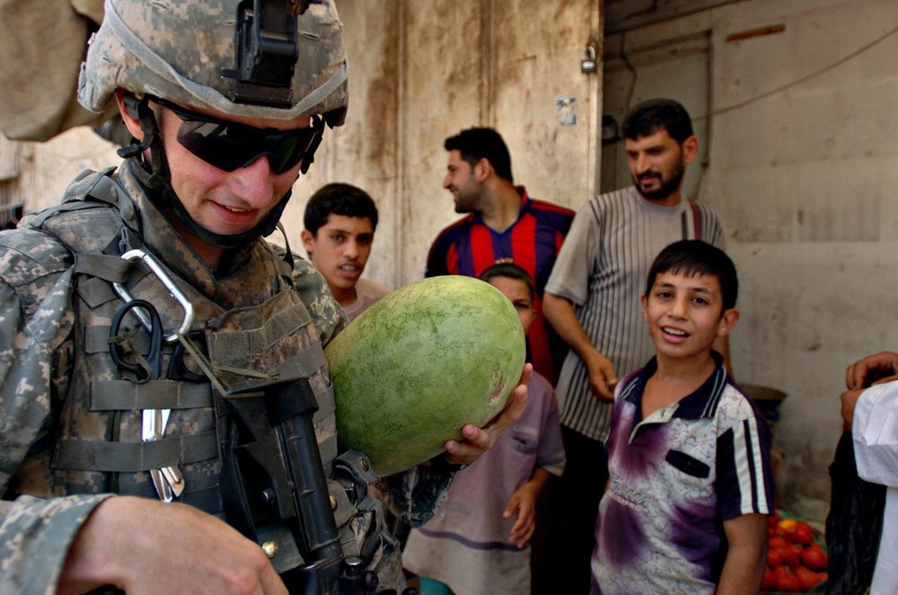 Paratrooper Gets Tasty Treat on Foot Patrol