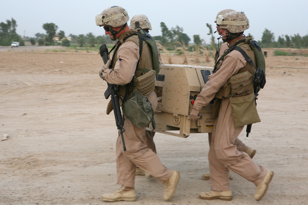 Marines Make ID Renewal Easier for Al Nuammia Residents