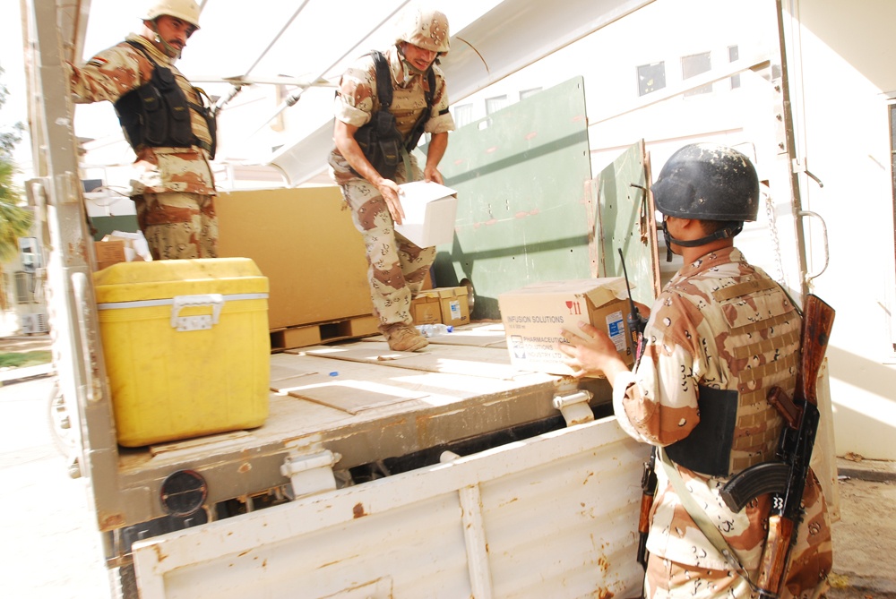 From Violence to Prosperity IA Soldiers Bring Supplies to Ramadi