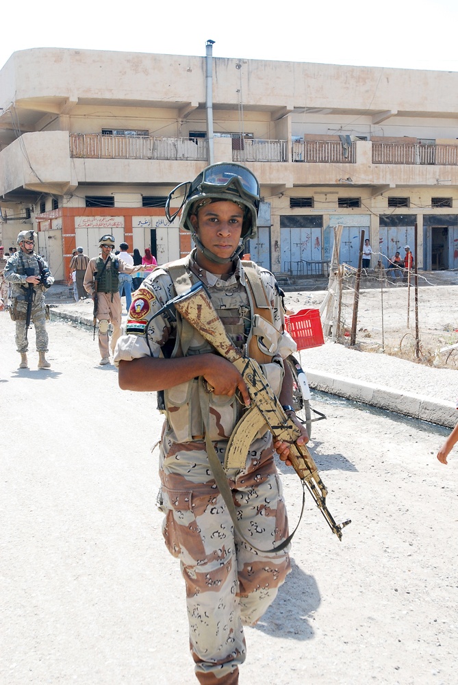 From Violence to Prosperity IA Soldiers Bring Supplies to Ramadi