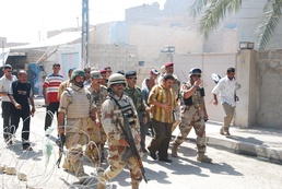 From Violence to Prosperity IA Soldiers Bring Supplies to Ramadi