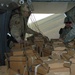 Coalition Forces, Blackwater Aviation Distribute Care Packages to FOBs