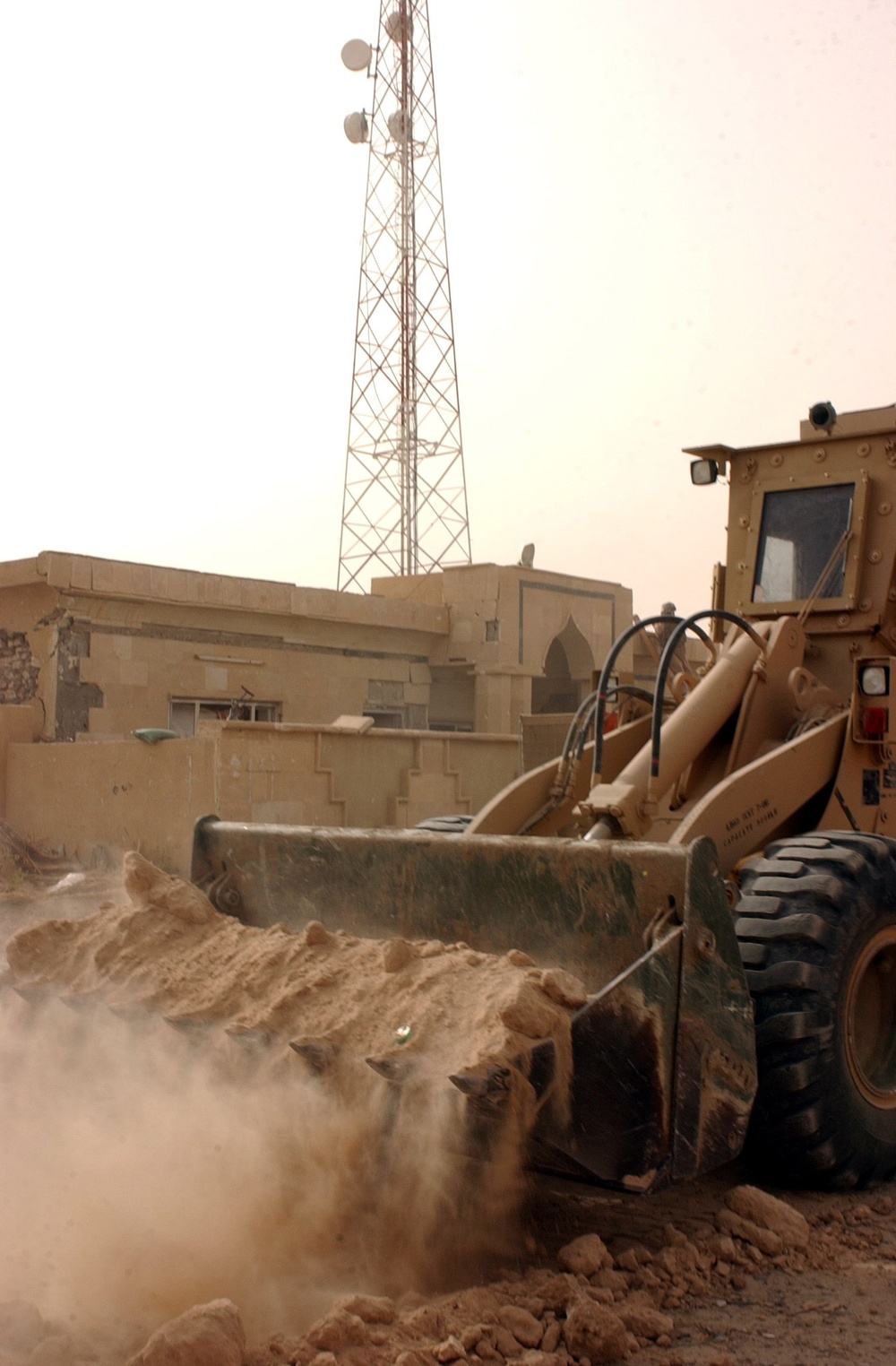 1st Brigade, 3rd Infantry Division provide reconstruction support at an Ira