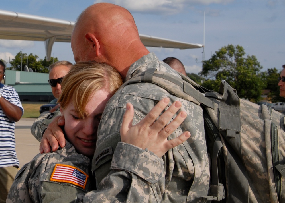 Spc. McCane Hugs Her Dad