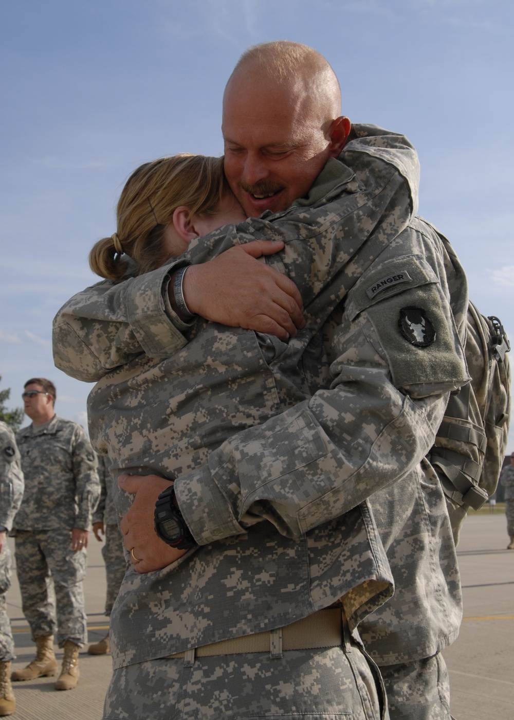 Spc. McCane Hugs Her Dad