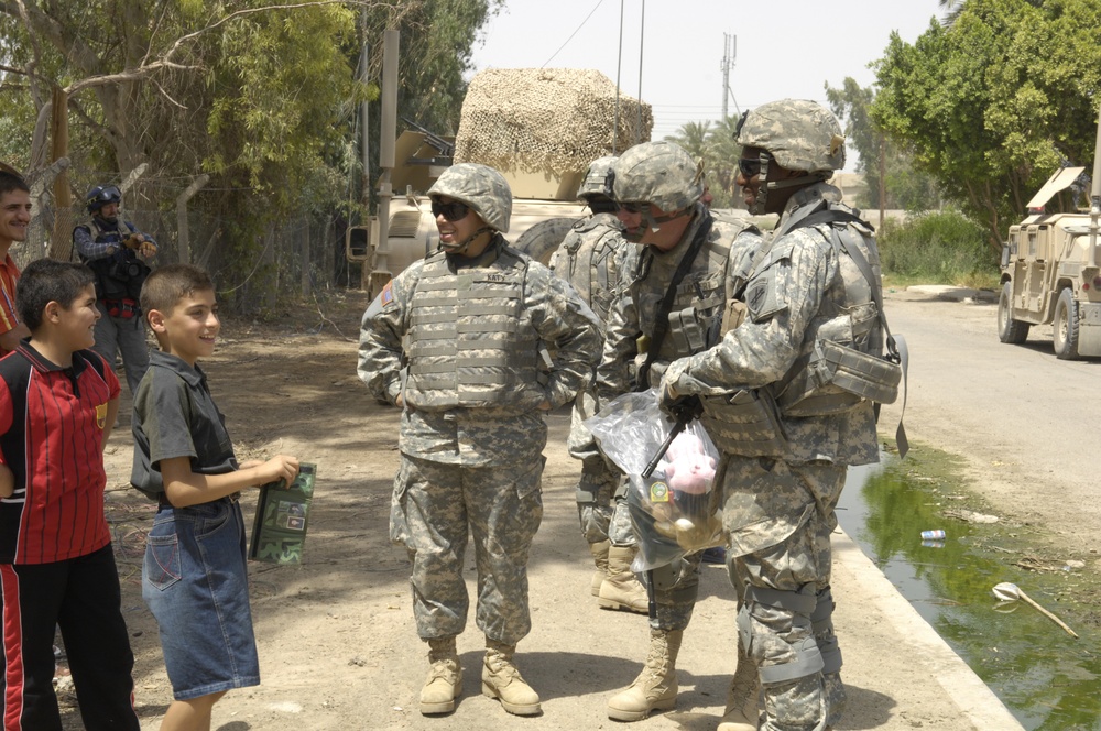 Soldiers With Iraqi Citizens