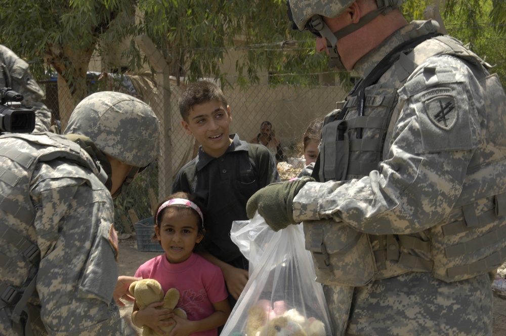 Soldiers With Iraqi Citizens