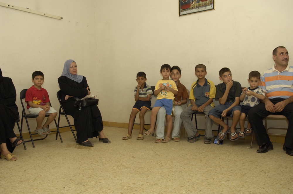 Soldiers With Iraqi Citizens