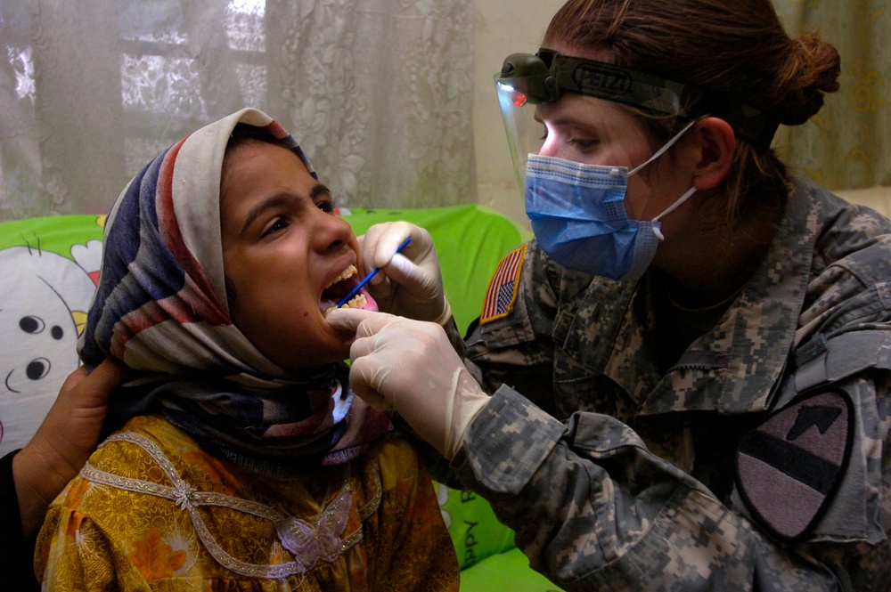 Troops provide dental, medical assistance to the residents of Janeen