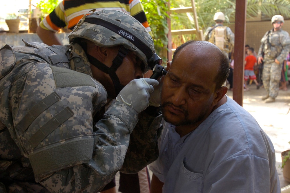 Troops provide dental, medical assistance to the residents of Janeen