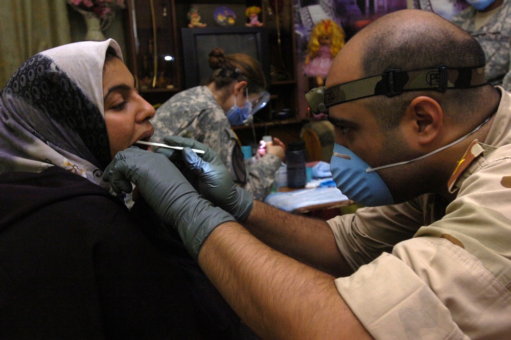 Troops provide dental, medical assistance to the residents of Janeen