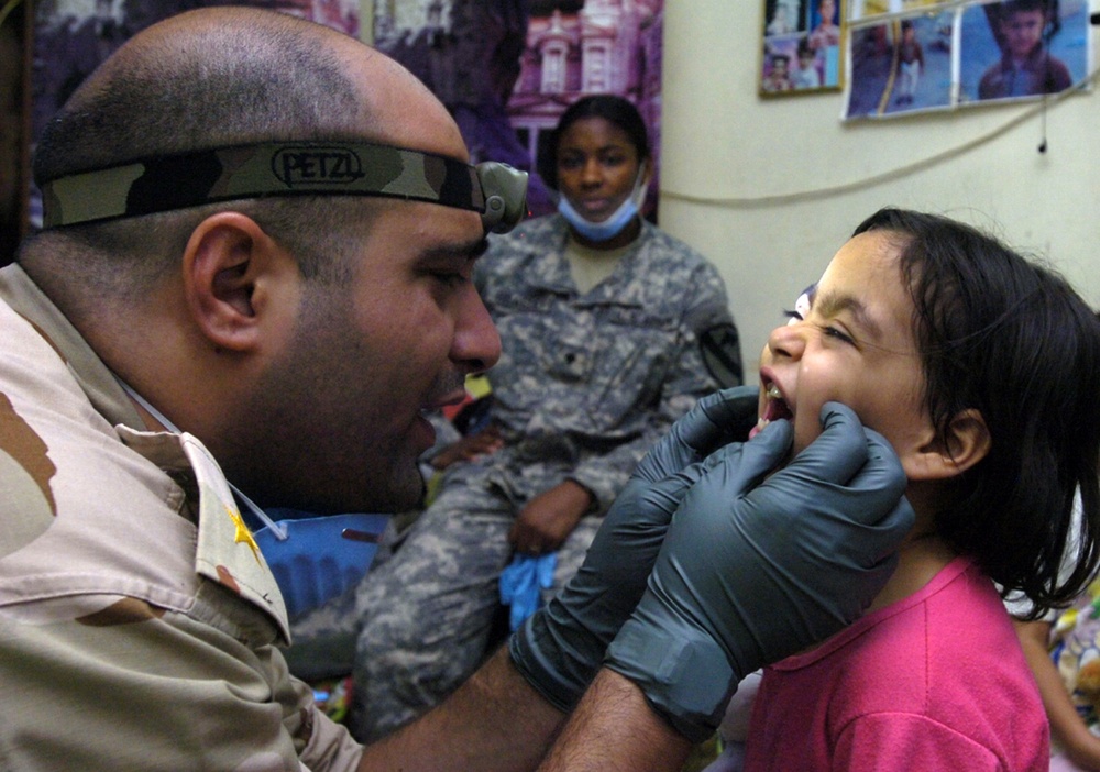 Troops provide dental, medical assistance to the residents of Janeen