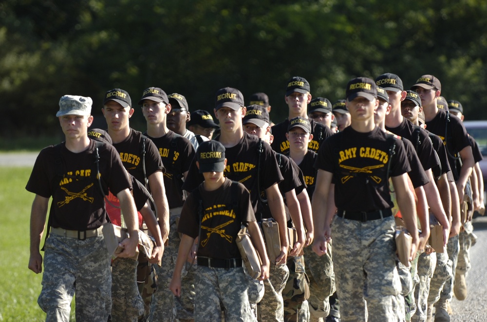 African American soldiers exhibit focus and strength in a rope