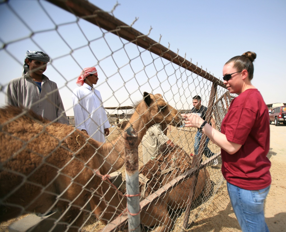 Service Members Visit Camel Rancher