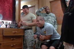 Impromptu UFC Warrior Visit Brings Smiles, Photo Ops And ... a Haircut?