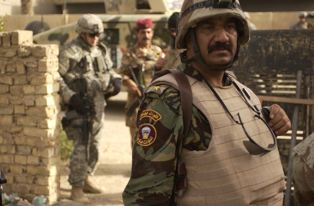 Search for weapon caches in Al Mansour