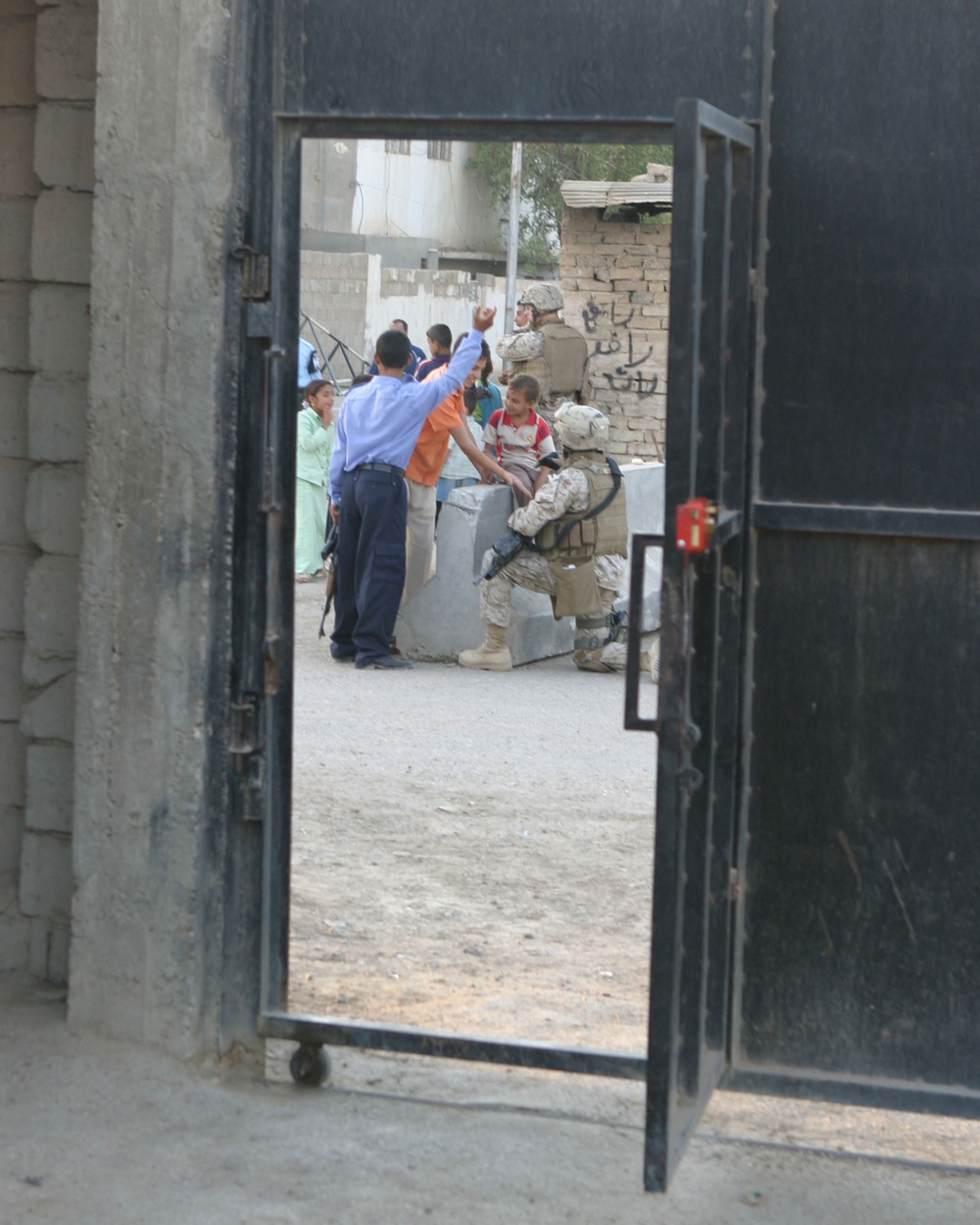 Marines, Iraqi Police Patrol Ramadi