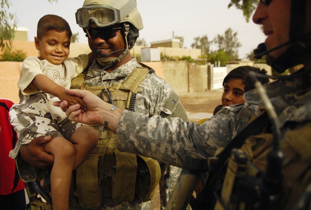 Soldiers Help Young Boy Get Surgery