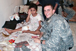 For Rusil: Troops Go the Distance to Care for Wounded Iraqi Girl