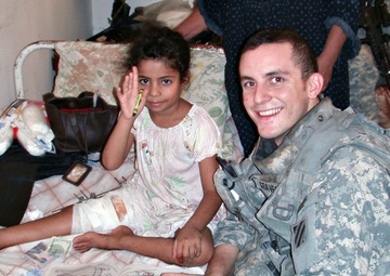 For Rusil: Troops Go the Distance to Care for Wounded Iraqi Girl